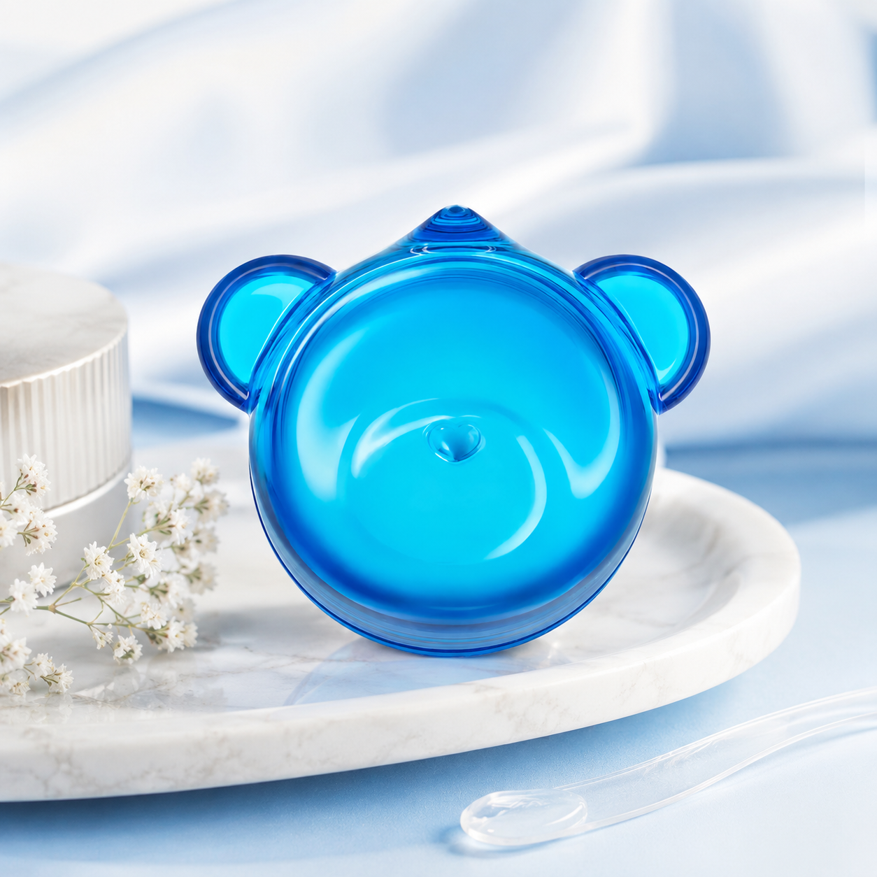 Dr.Jart+ Vital Hydra Solution Lip Mask 20ml displayed on a white marble tray with delicate white flowers and a skincare spatula, highlighting its hydrating, soothing and nourishing lip care formula in a fresh, elegant setting.